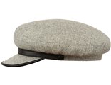 La gorra muy estilosa Islay de tipo Maciejowka hecha a mano en Polonia de Harris Tweed y cuero natural